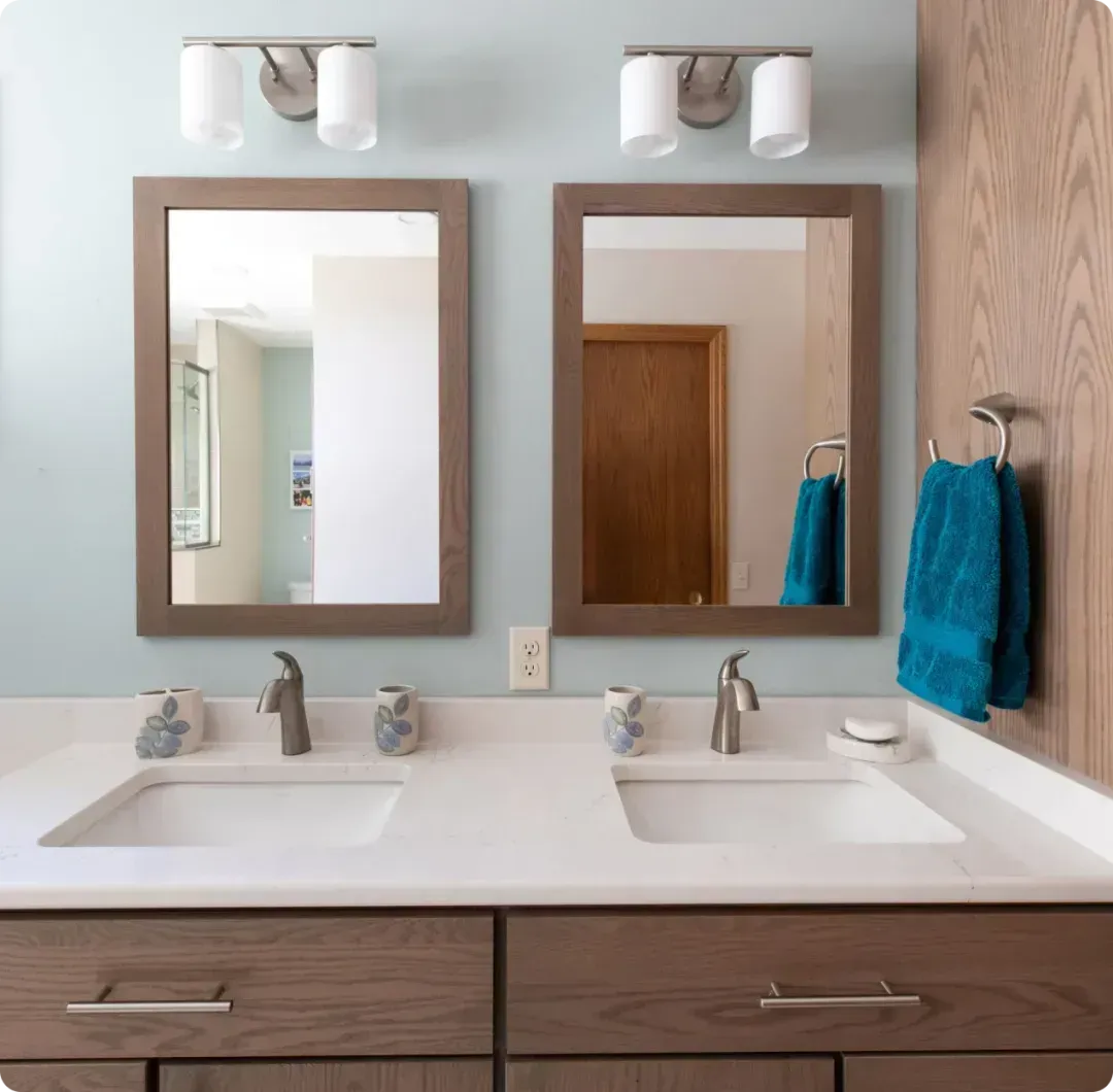 Elegant bathroom renovation with updated vanity and shower by Bella Domicile