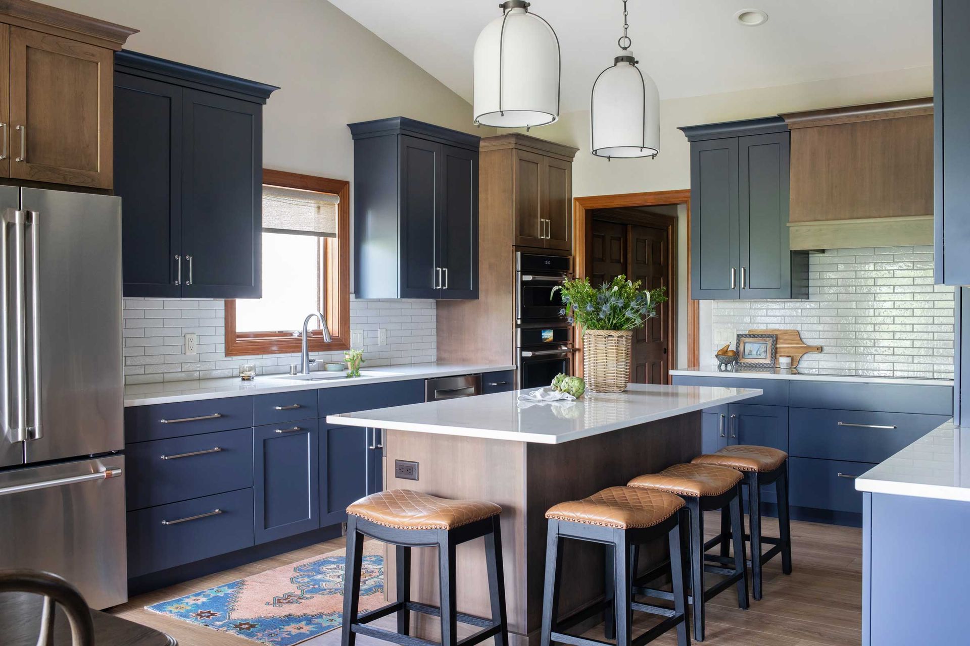 Custom kitchen remodel with updated cabinetry and countertops by Bella Domicile