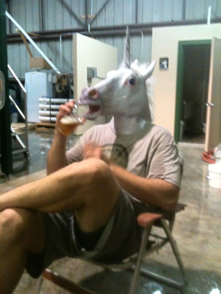 Guy Drinking a Beer with a Horse Mask - Magnolia, TX