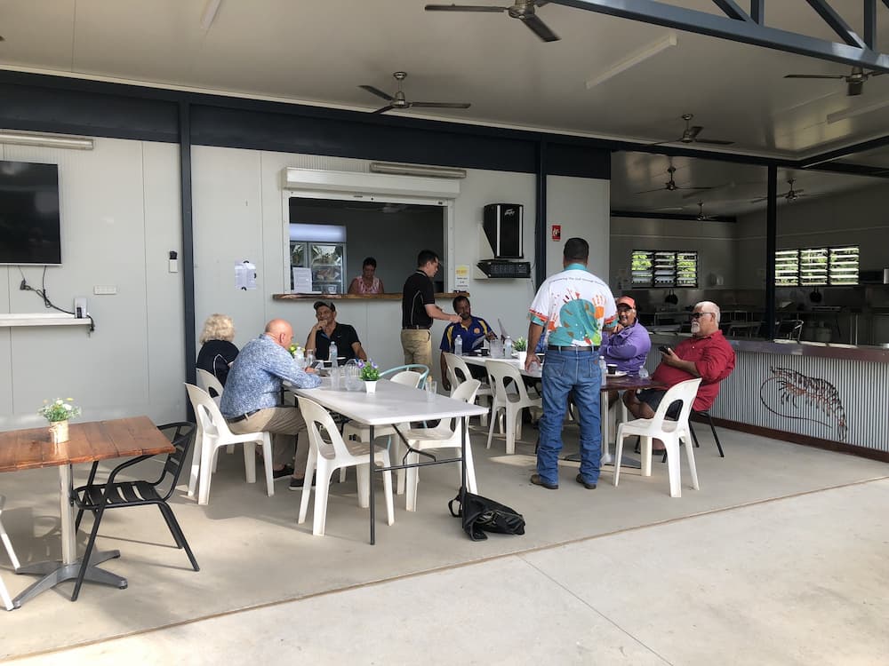 People at Outdoor Cafe Tables Near a Serving Counters — Karumba Point Holiday Tourist Park in Karumba, QLD