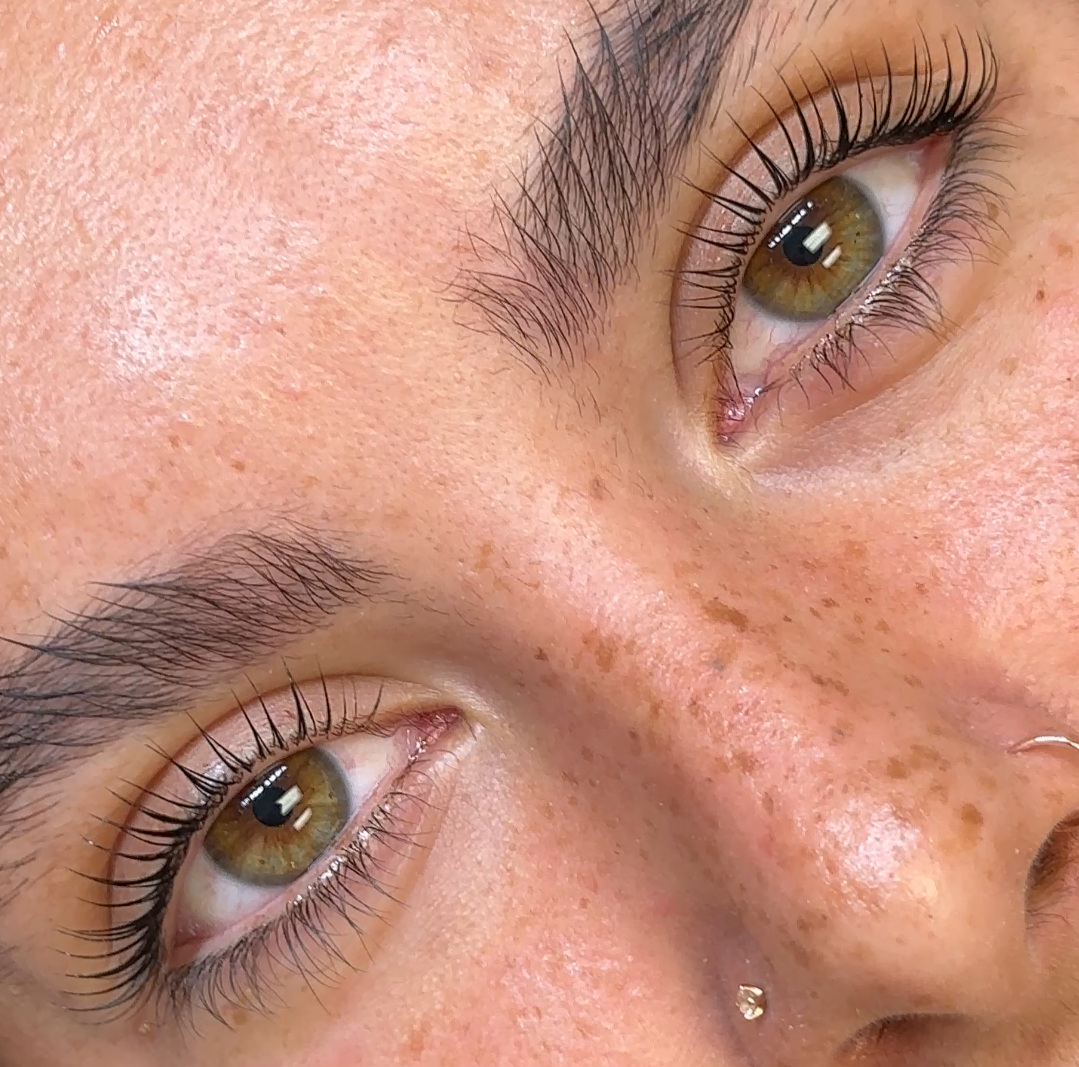 A woman is getting Korean Lash Lift at a beauty salon. A woman is getting a keratin collagen Korean Lash lift at a hair removal salon