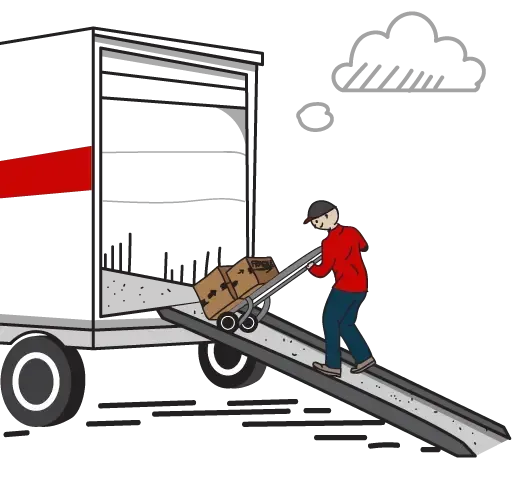 Person in red jacket using a hand truck to load boxes into a truck up a ramp.