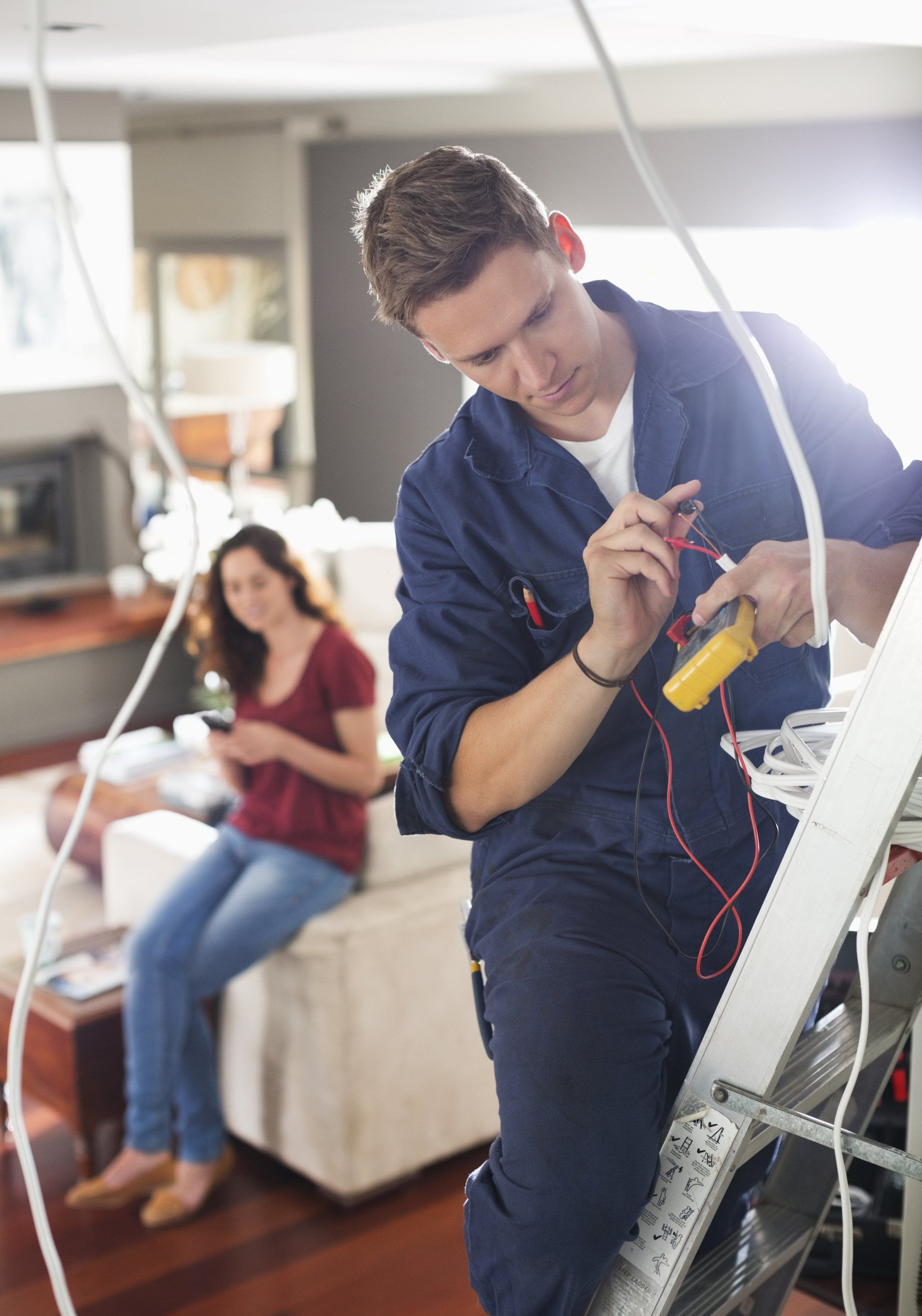 Man In Blue And Girl Seating | Yankton, SD | Brightway Electric LLC