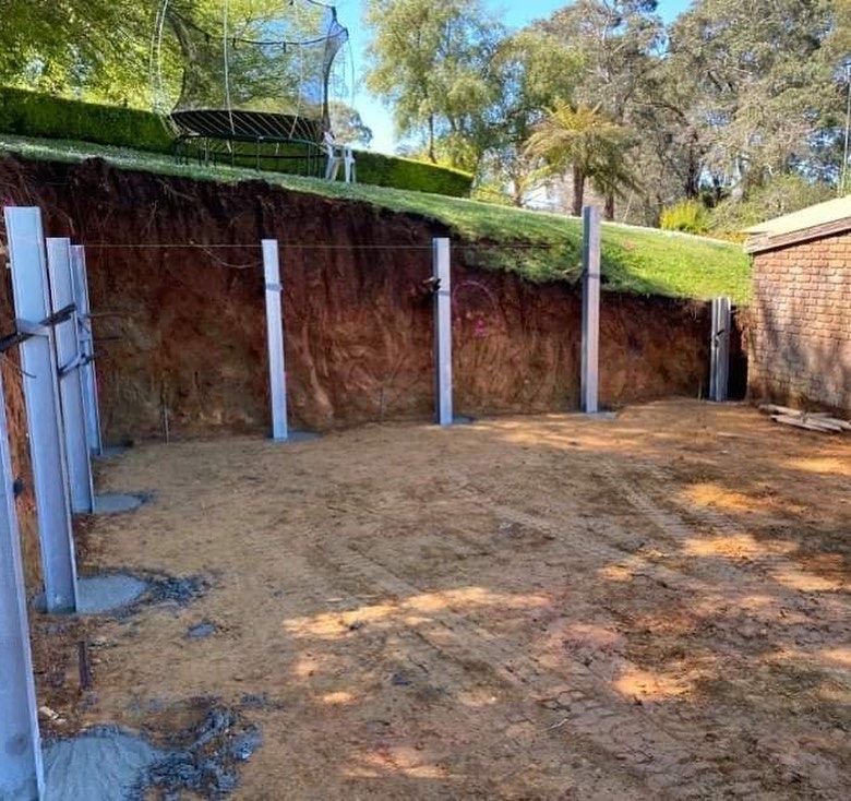 retaining wall construction metal posts