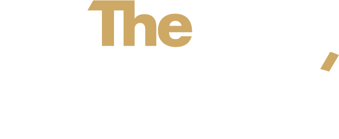 Gold “The” text on a white background with a small gold comma-like mark to the right