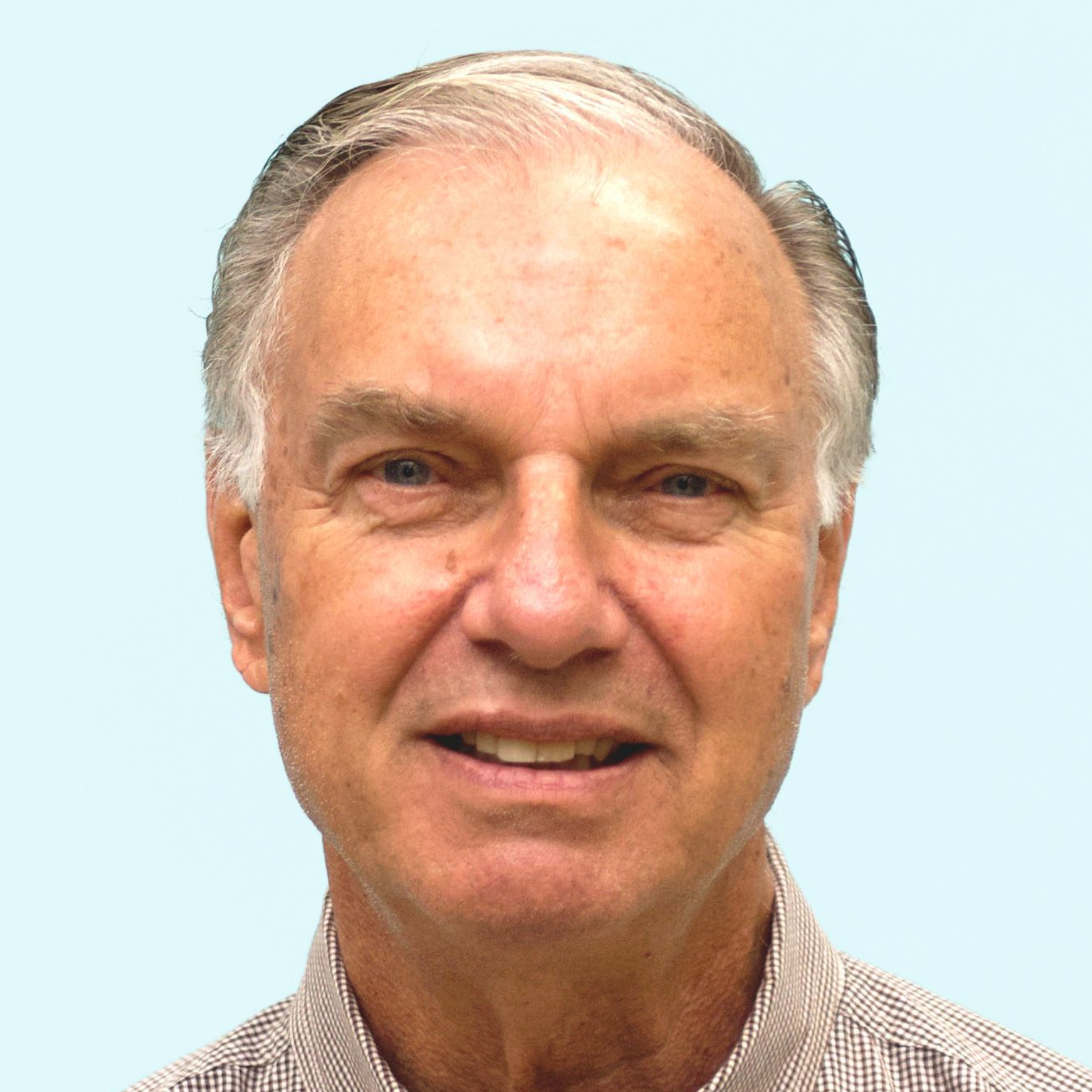 A photo of Board Member Bruce Hutchinson.