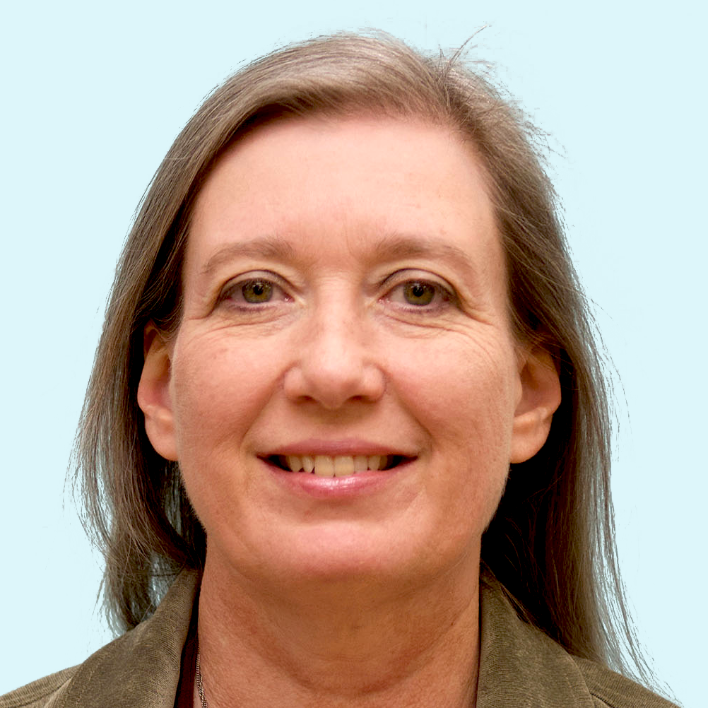 A photo of Director of Compliance Gina Selby.