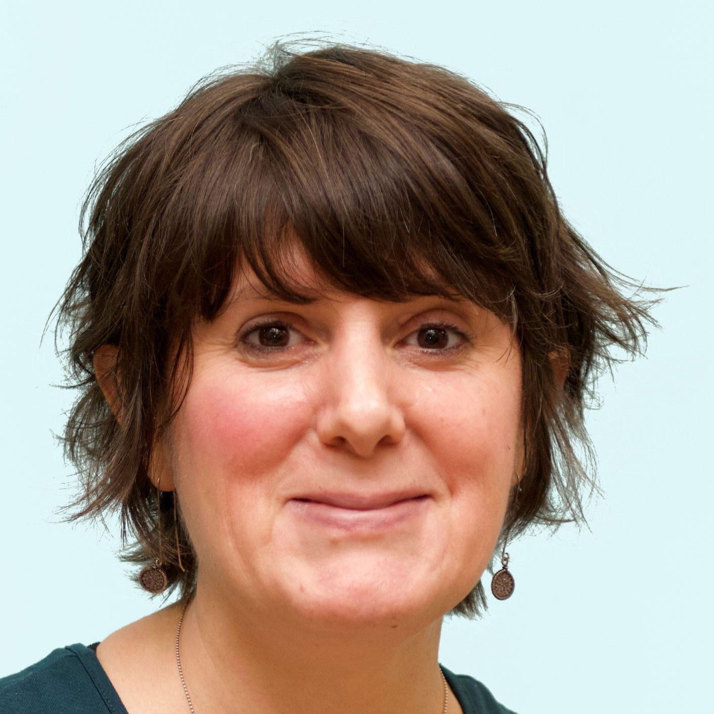 A photo of Board Member Sarah Moore.