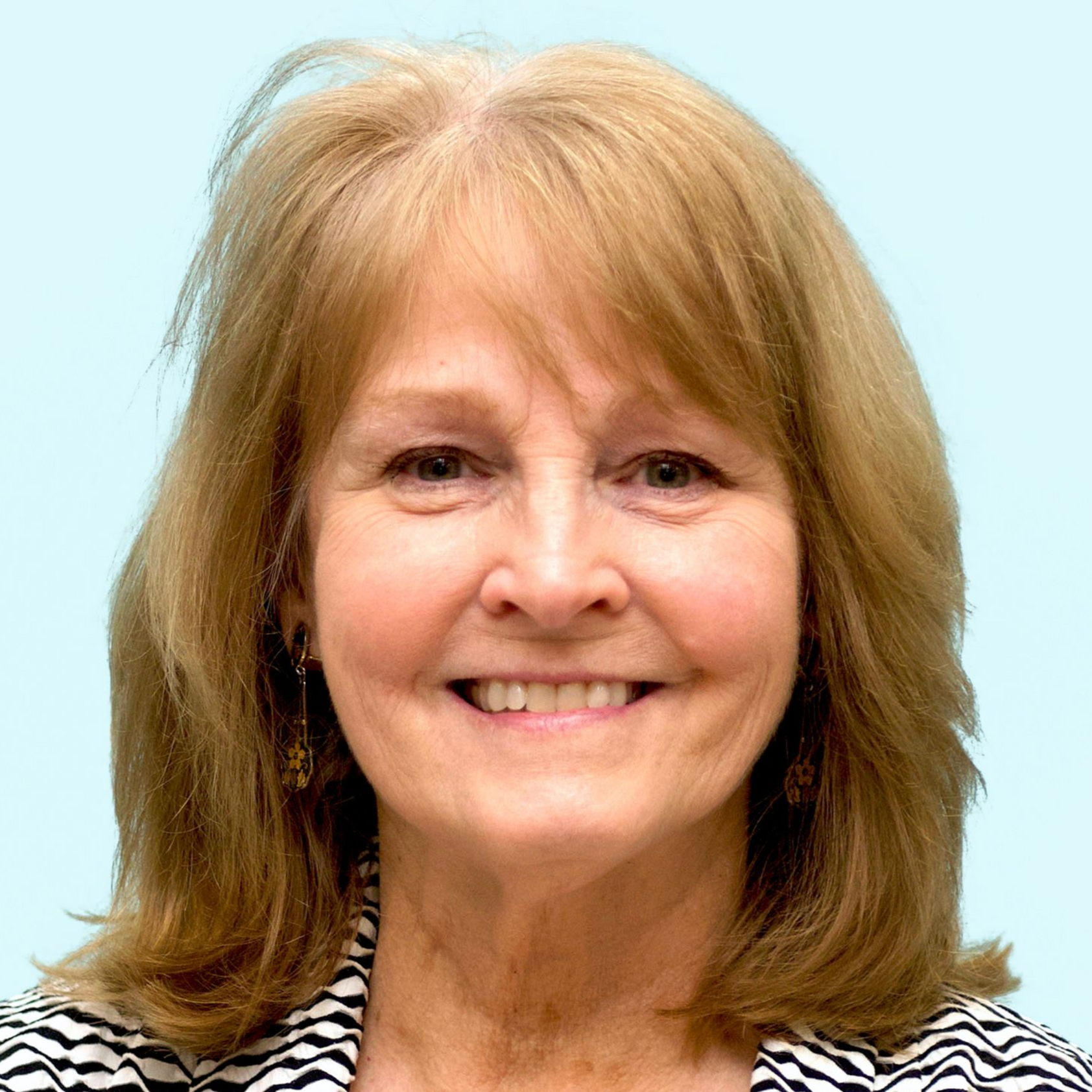 A photo of Vice President of the Board Susan Rouse.