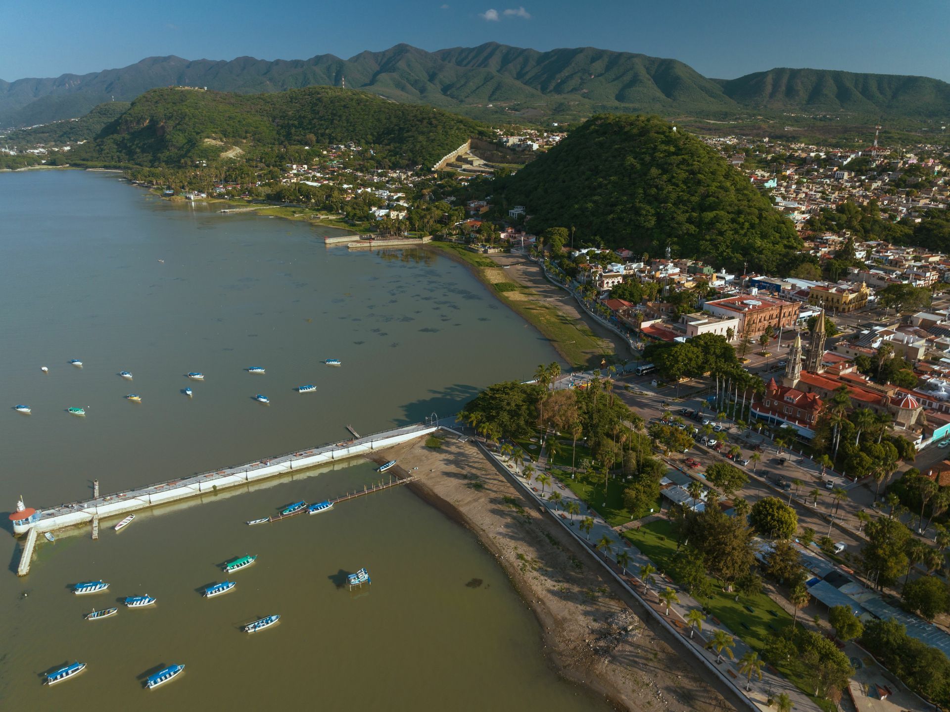 An aerial view of a bridge over a body of water