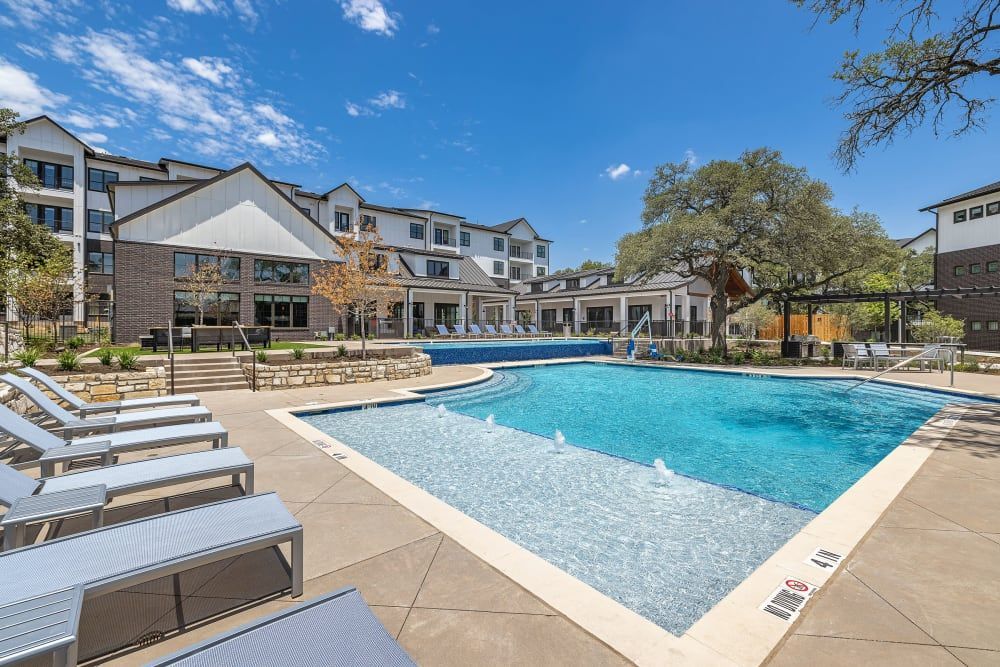 Resort Style Pool at The Avery, which offers apartments for rent in Avery Ranch.