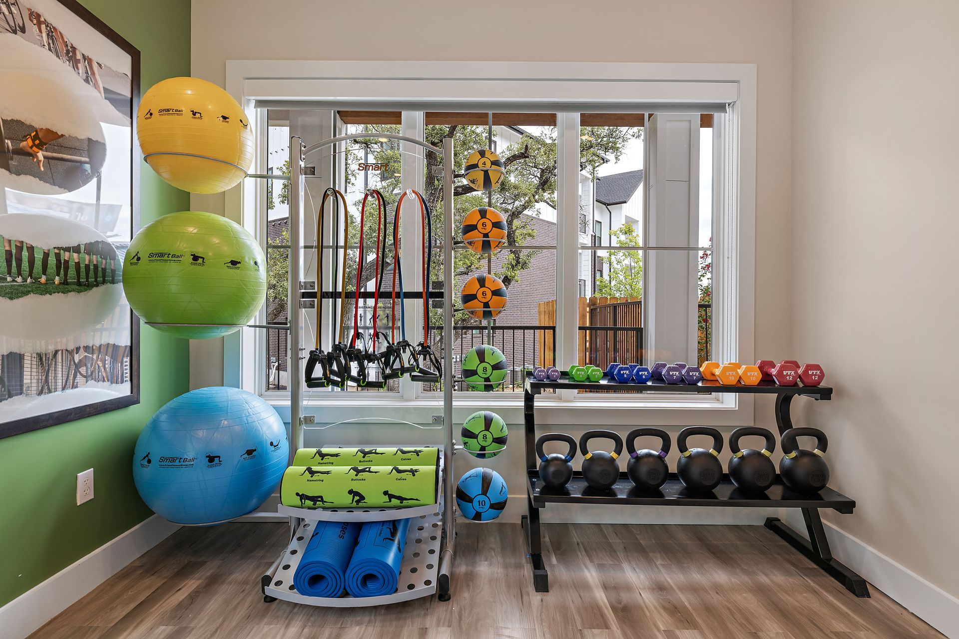 Gym with a lot of exercise balls and dumbbells  at The Avery, offers apartments for rent in Brushy Creek Austin, TX.