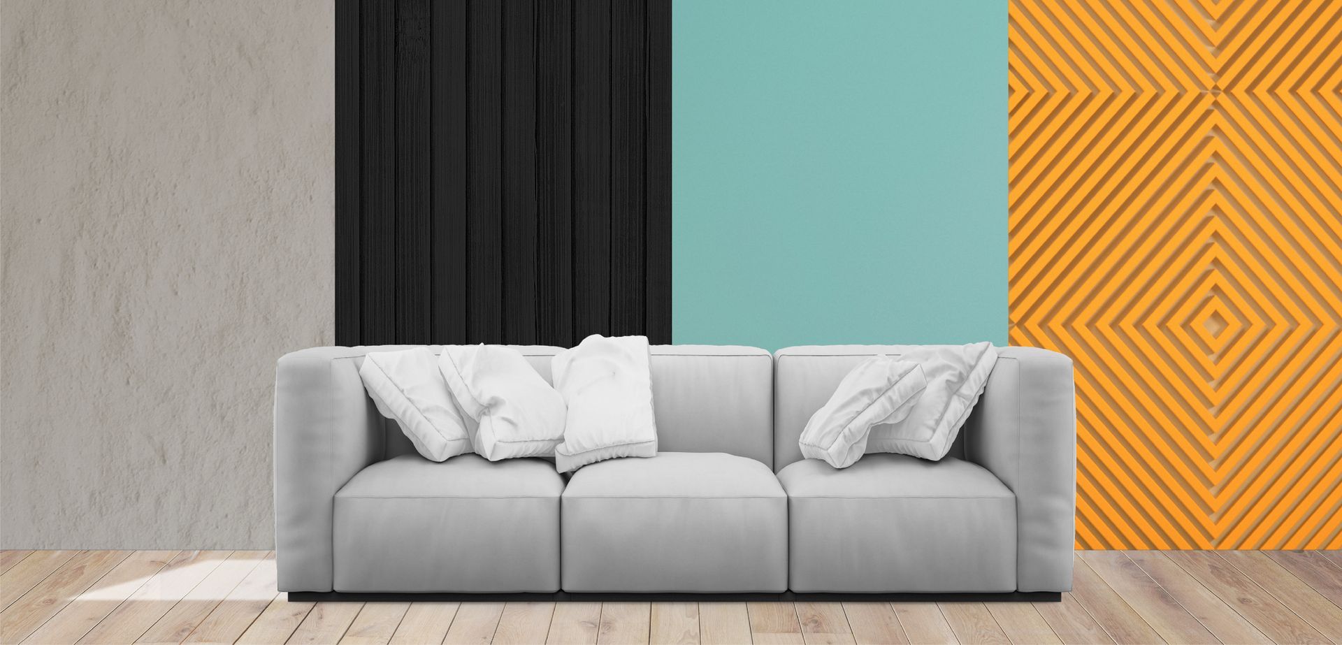 A couch is sitting in a living room with a colorful wall behind it.