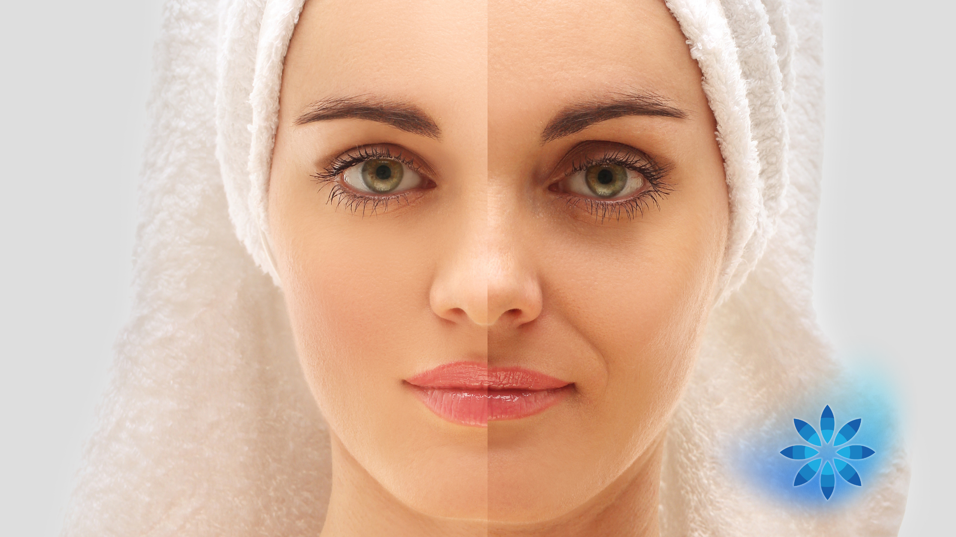 Close-up of a person with a white towel wrapped around their head and a blue flower icon in the corner