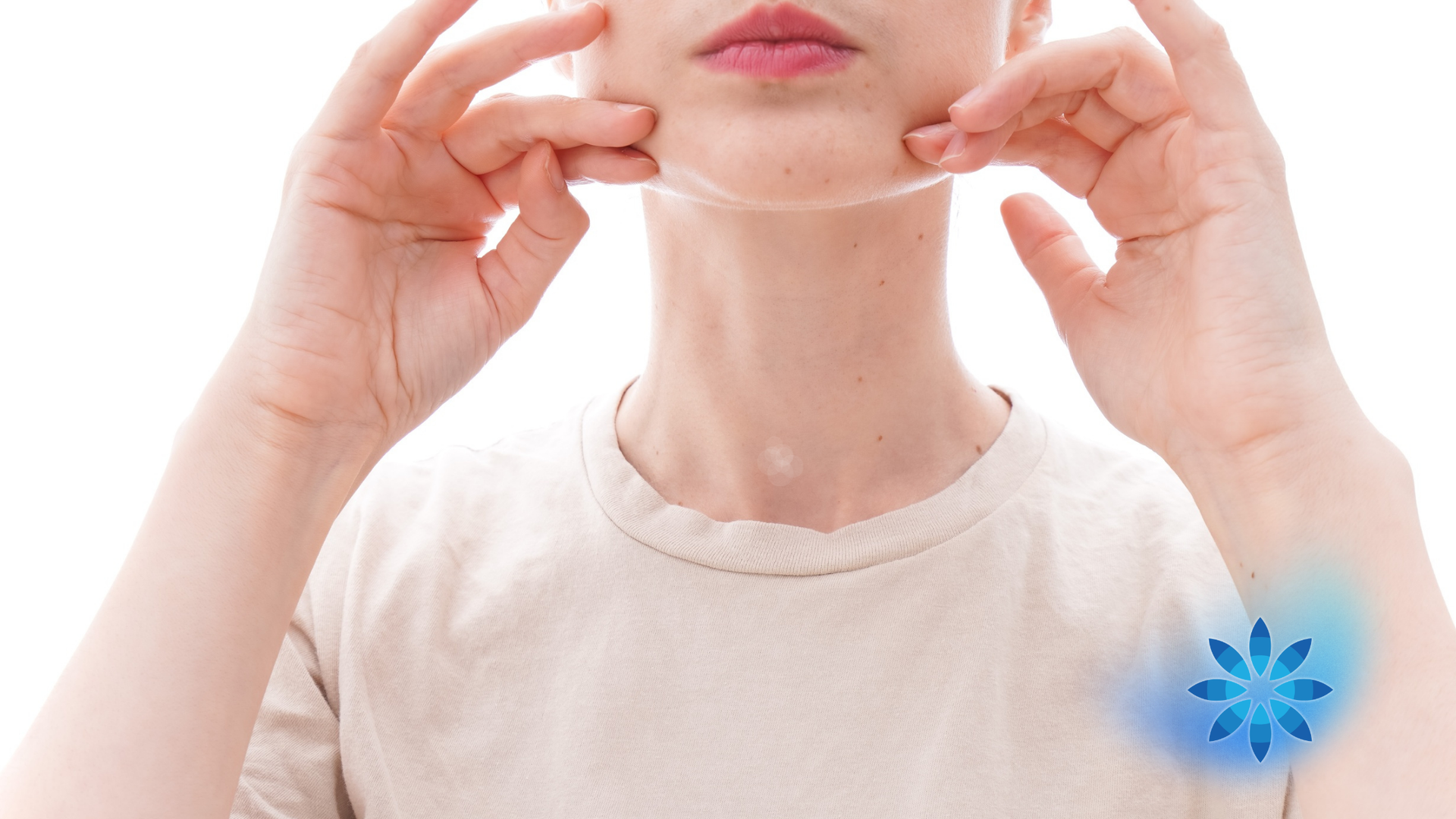 Woman holding the skin on her cheeks, possibly practicing a facial exercise.