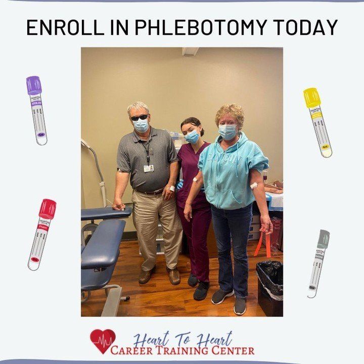 Three people in a phlebotomy training setting. Two have arm bandages, a third is assisting. Drawn blood vials frame the photo.