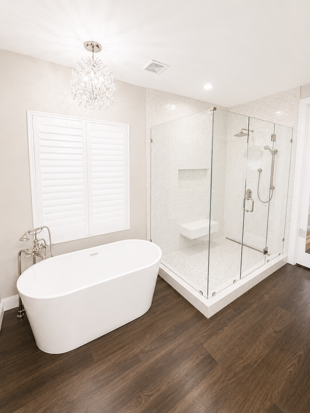 Modern bathroom with white soaking tub, glass shower, window shutters, and dark wood floor