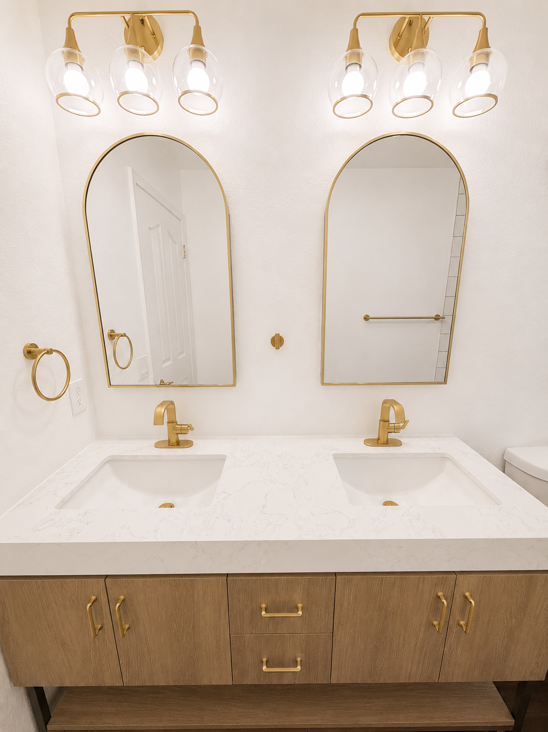 A bathroom with a tub , shower , and toilet.