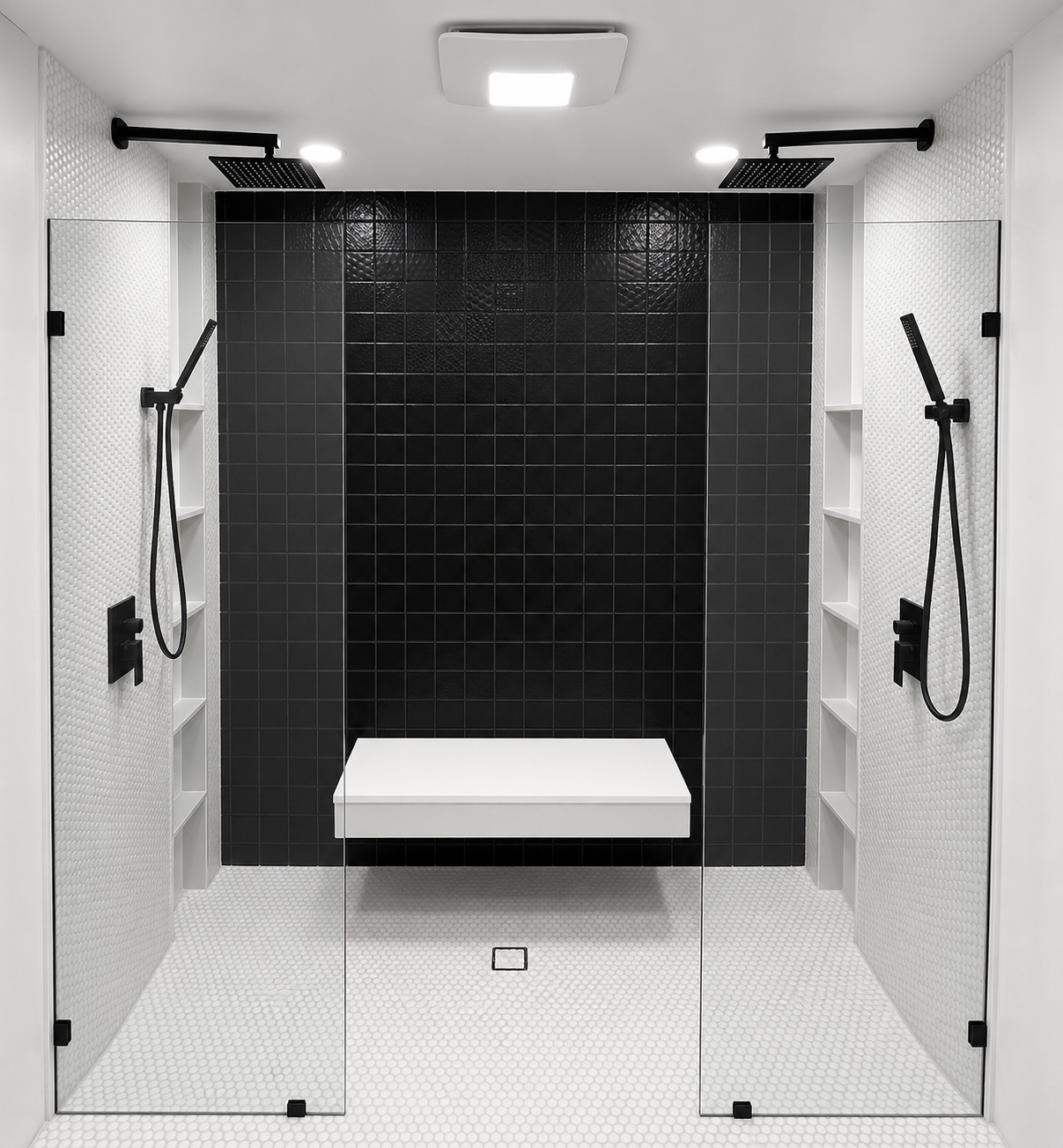Modern shower stall with black tile back wall, white bench, and wall-mounted grab bars on both sides