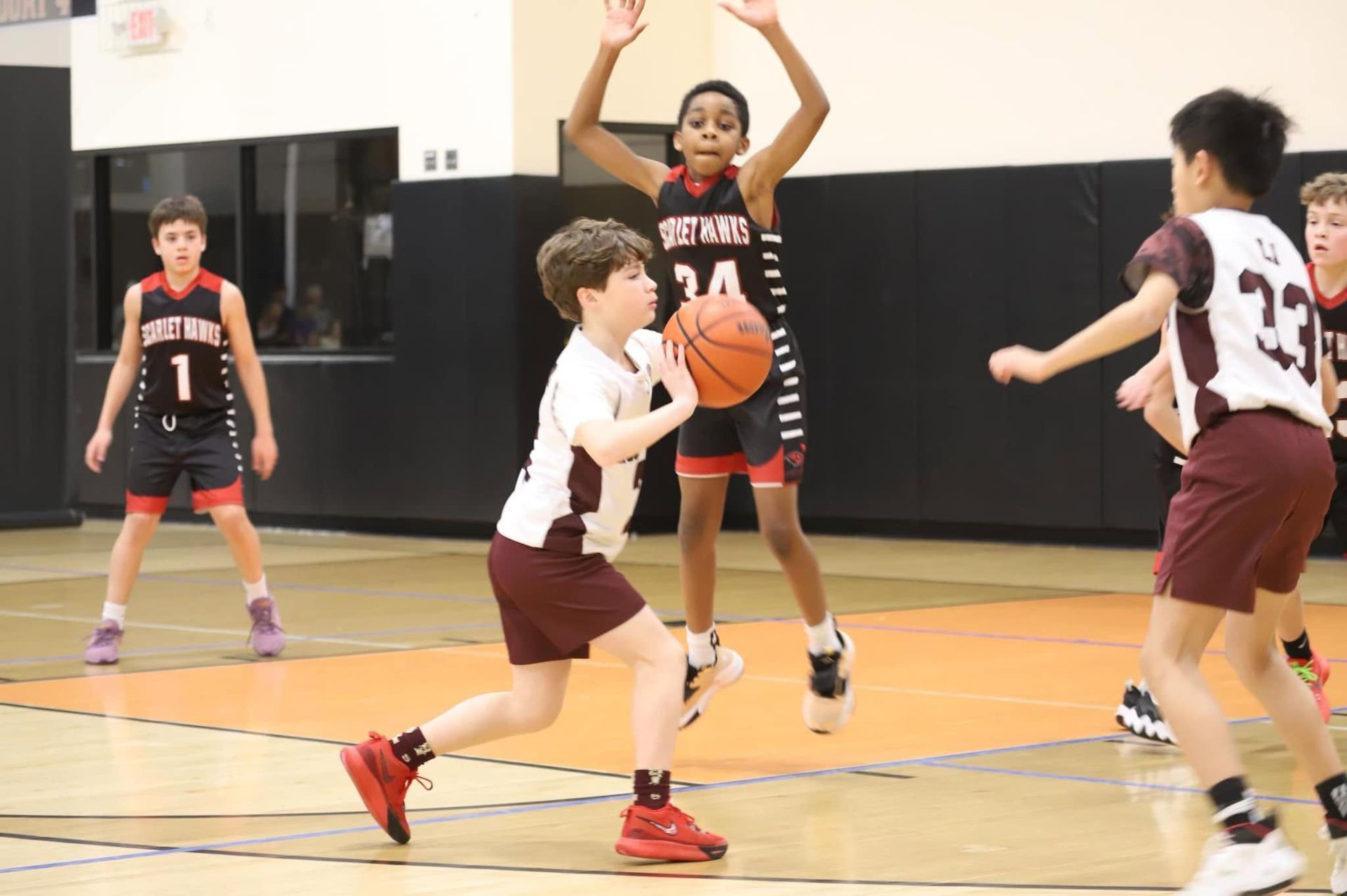 nyba player passing the ball to his teammate