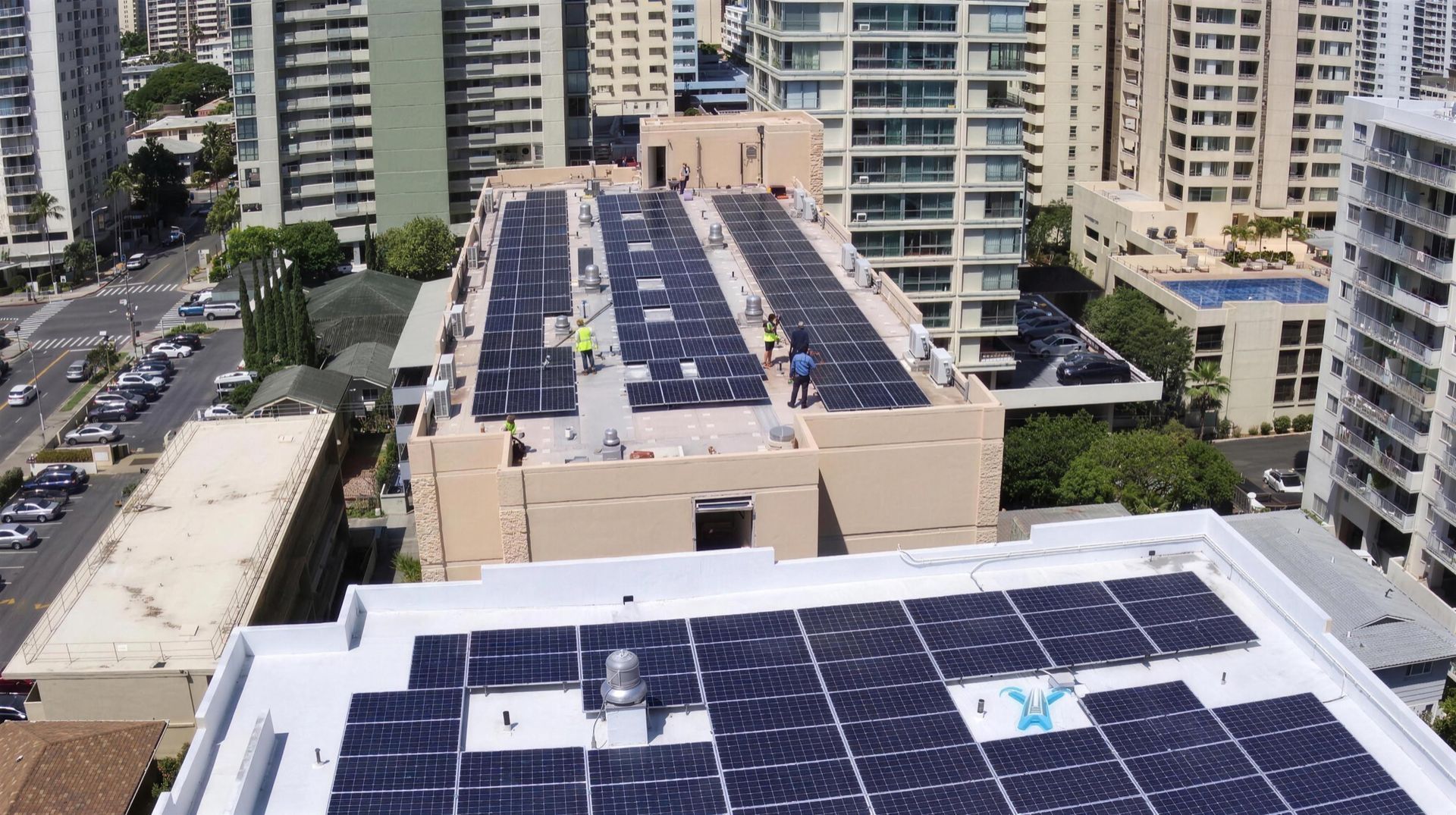 Drone view of a commercial rooftop solar array in Honolulu