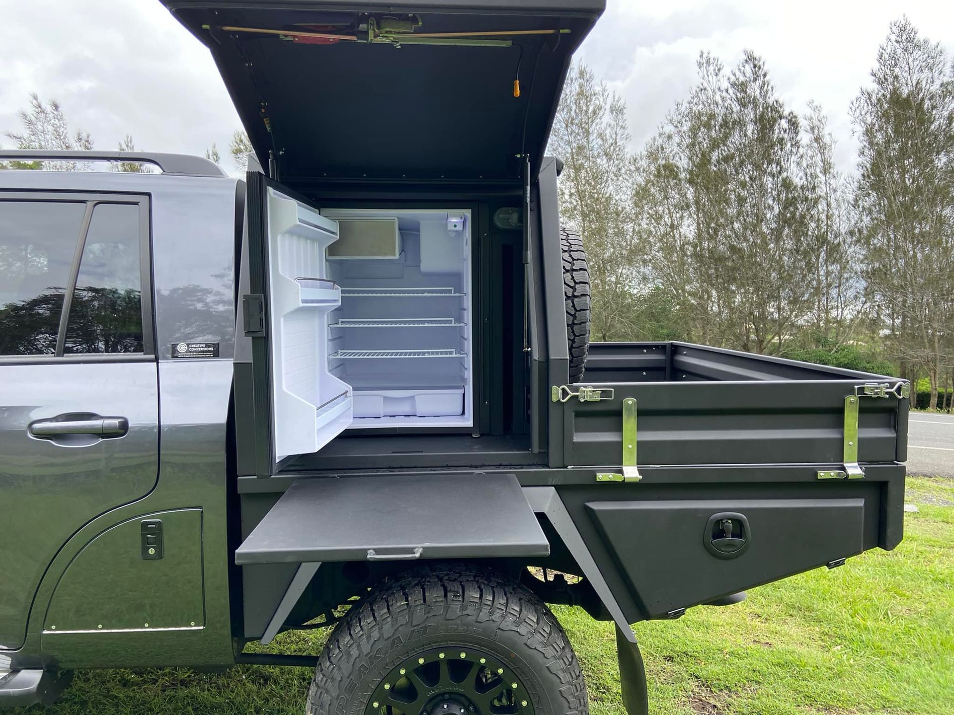 Dark Grey Pickup Truck With Open Side Compartment, Refrigerator Inside, Open on the Side — Custom RV Creations in Sumner, QLD