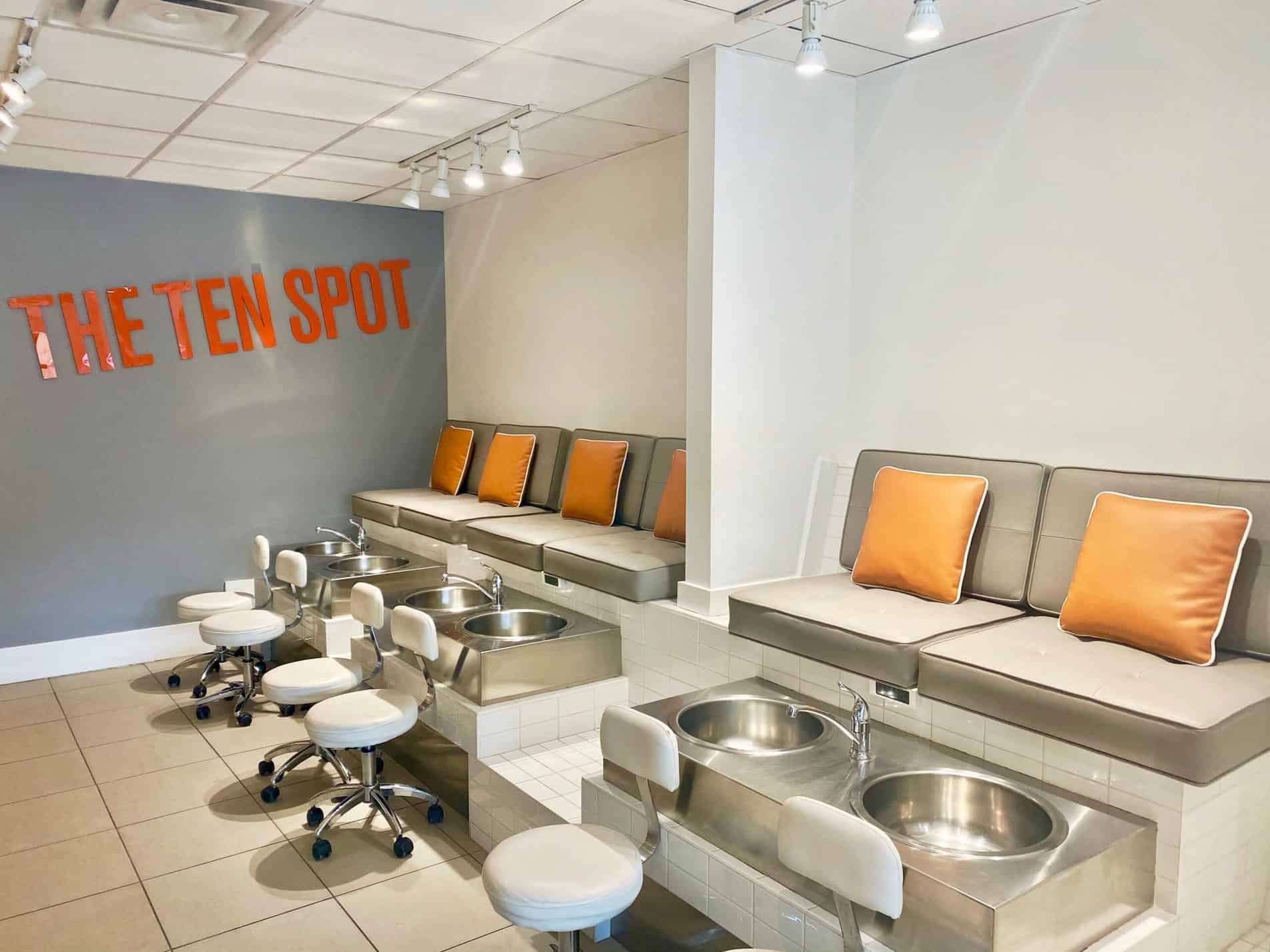 A nail salon with a sign that says the ten spot