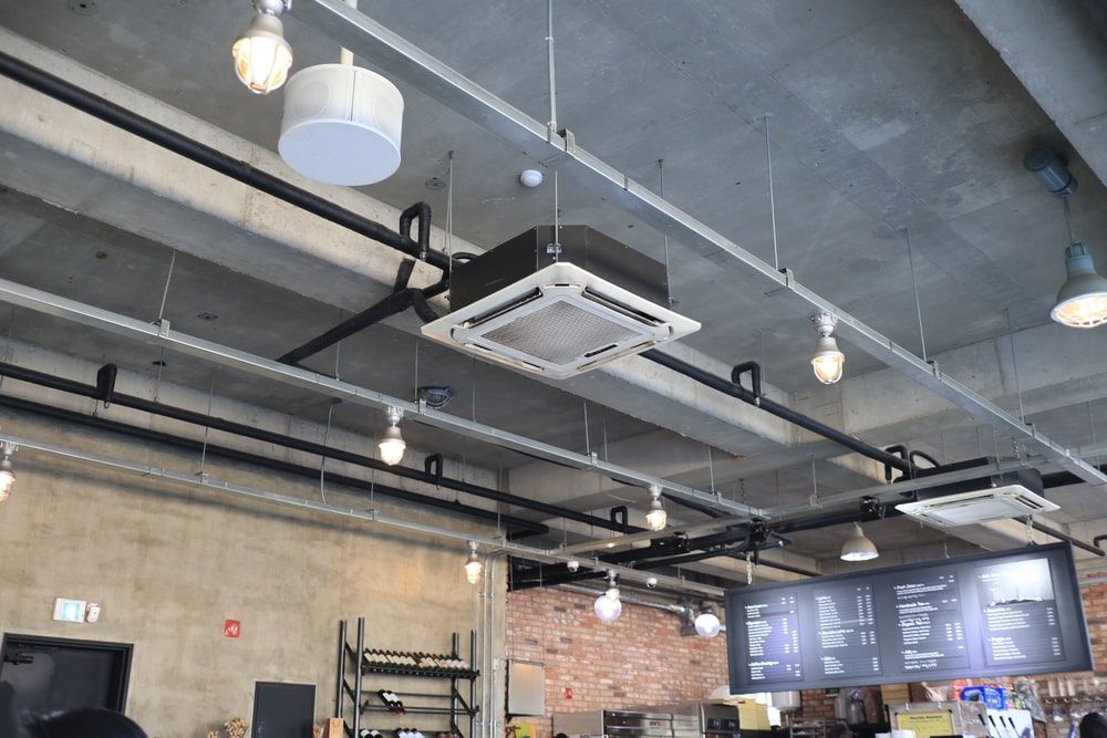 An Air Conditioner Hanging from The Ceiling — Gordon's Air Conditioning & Refrigeration Services in Mooloolaba, QLD