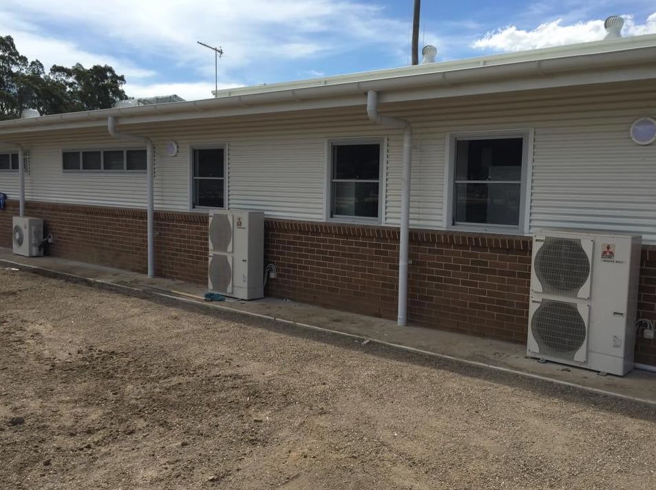 Air Conditioner Exhaust in a Residential Area — Gordon's Air Conditioning & Refrigeration Services in Caloundra, QLD
