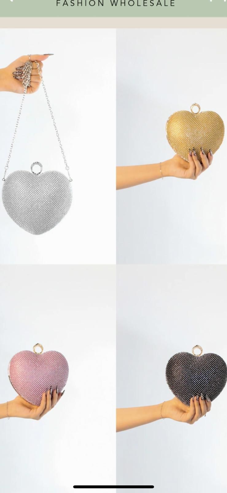 The proposal purse-silver-black-gold-pink