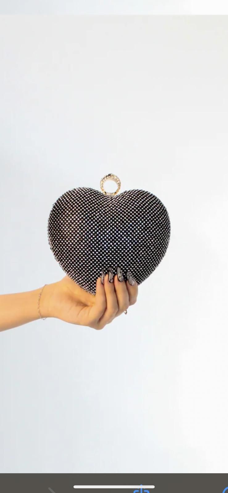 The proposal purse-silver-black-gold-pink