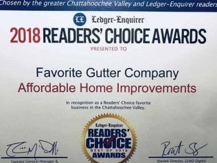 A certificate that says `` favorite gutter company affordable home improvements ''