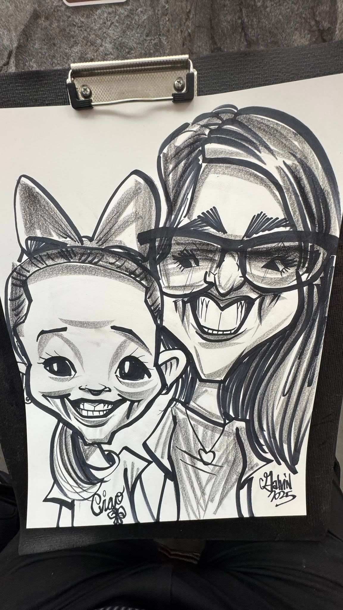 Black-and-white cartoon sketch of two smiling people, one wearing glasses, on a clipboard.
