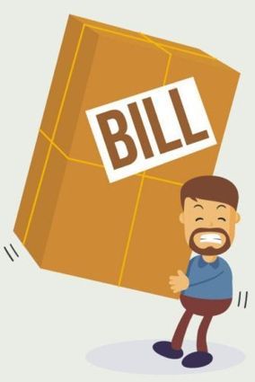 a man is carrying a large box with the word bill on it