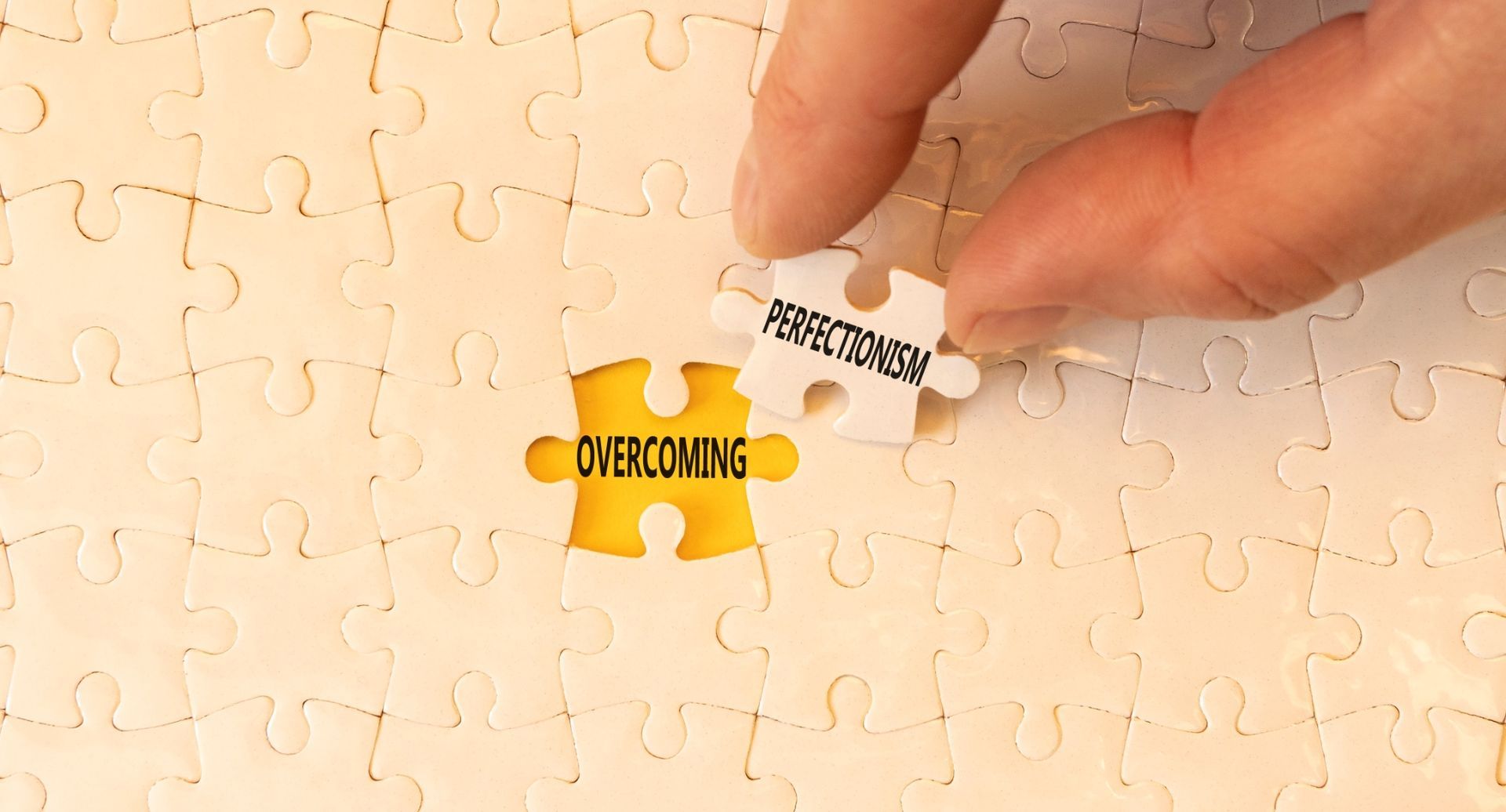 Person reflecting on perfectionism and mental health