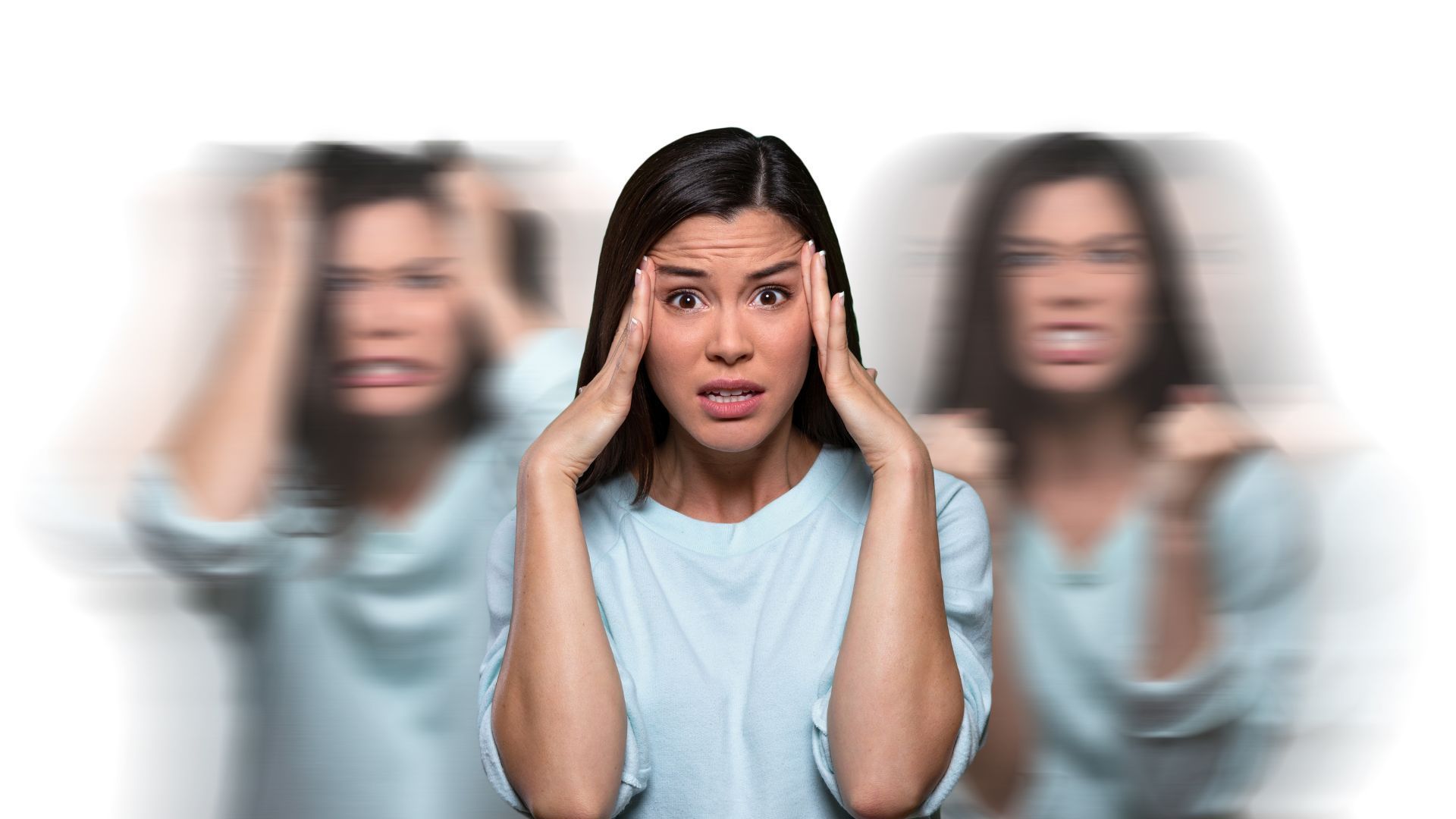 Distressed woman holding her temples with blurred duplicates behind her on a white background