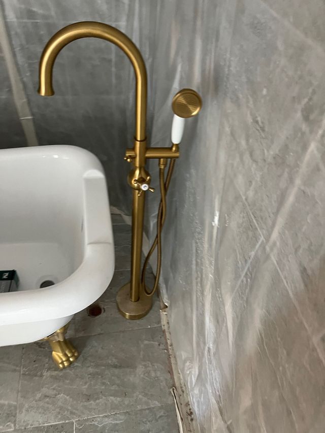 Plumber repairing a kitchen sink.