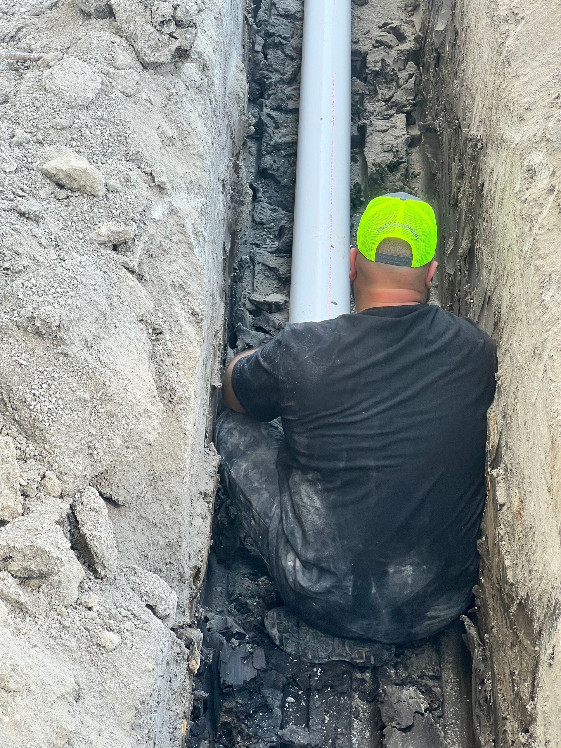Boulevard Plumbing team member inspecting plumbing lines