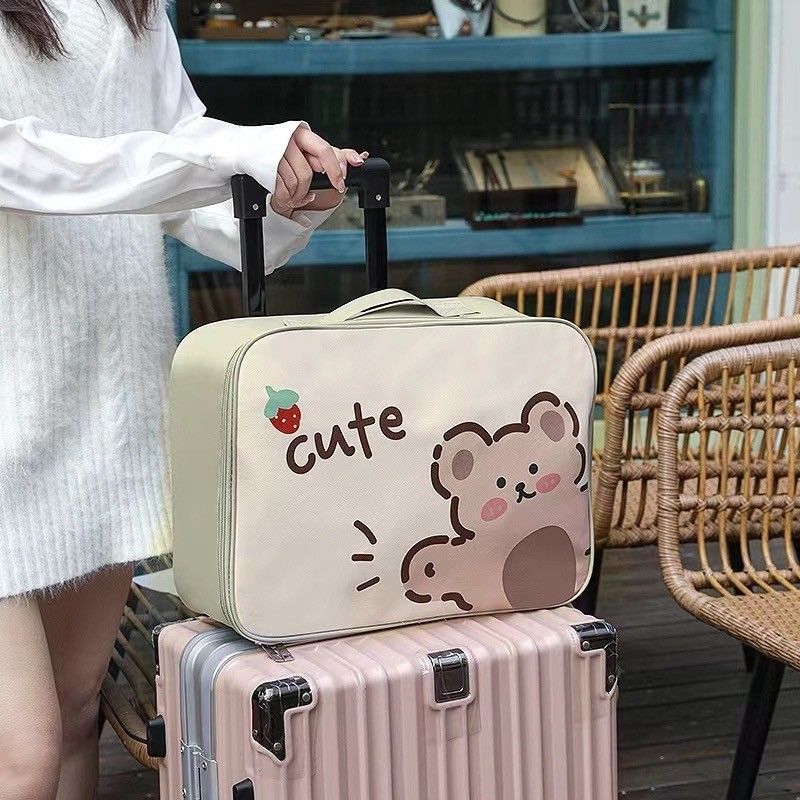 卡通行李旅行包