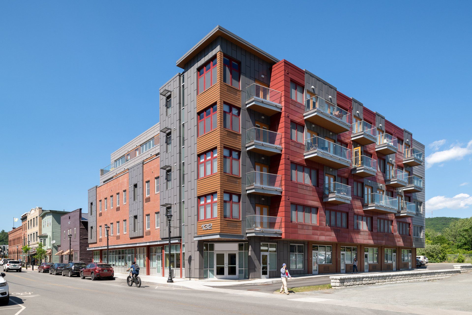 A large apartment building with a lot of windows and balconies