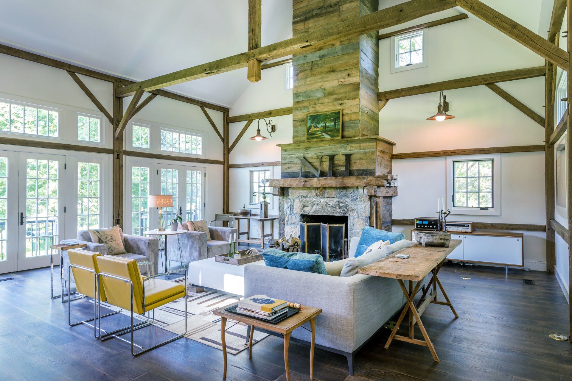 There is a fireplace in the middle of the living room.