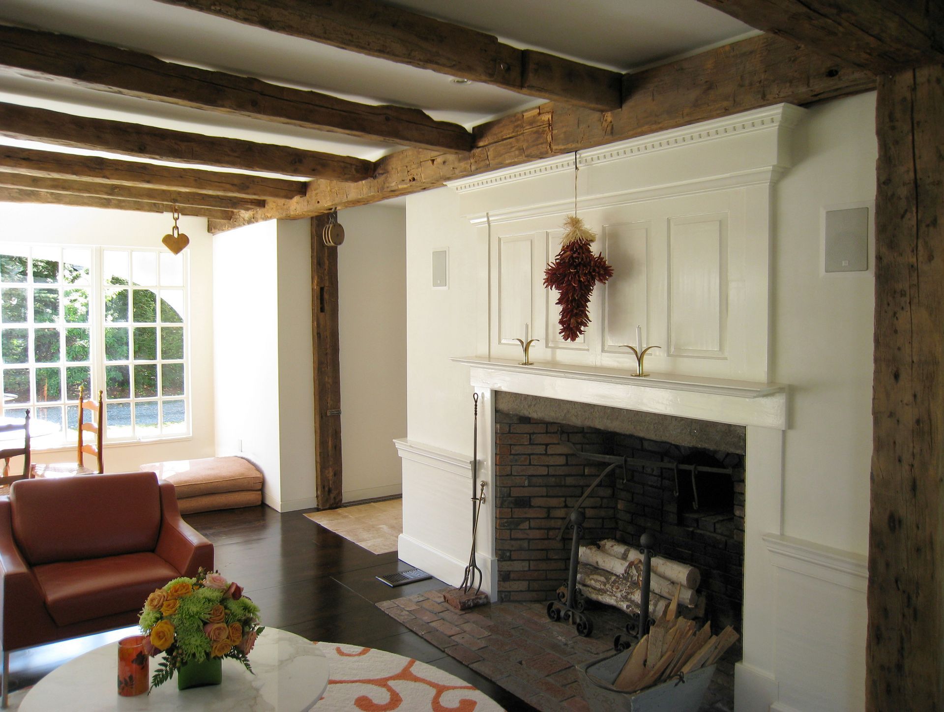 A living room with a fireplace and a couch