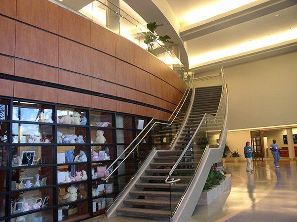 A Large Lobby with Stairs Leading up To the Second Floor