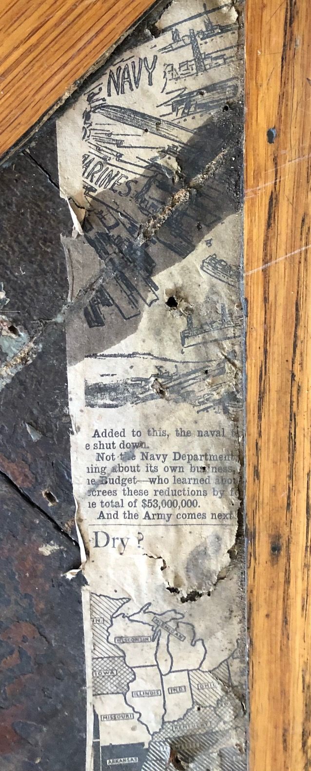 A close up of a piece of paper on a wooden surface.