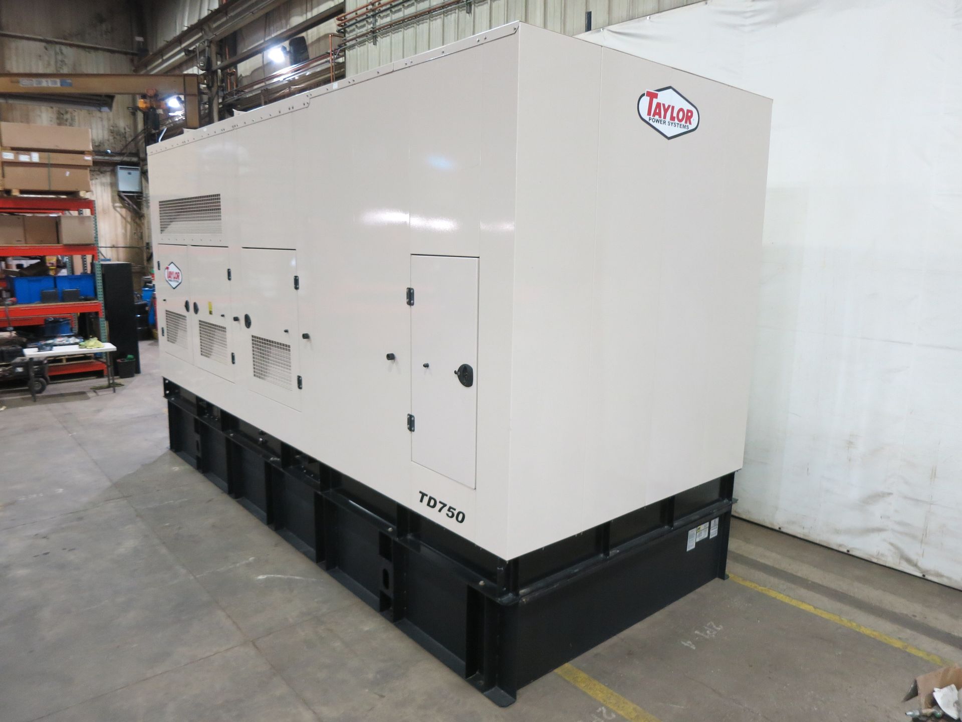 Large beige industrial generator labeled