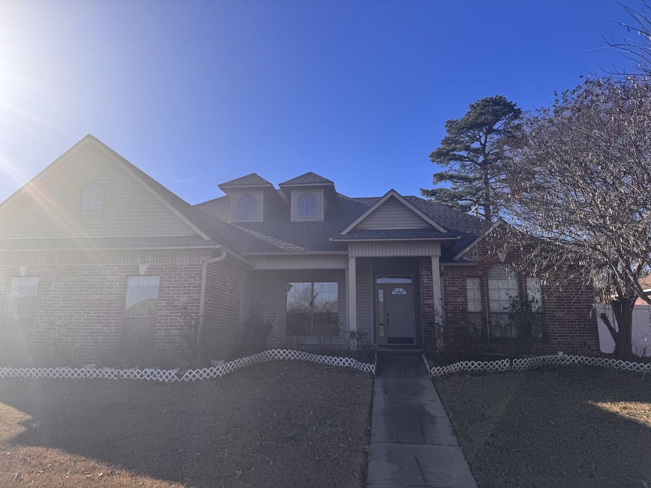 New Owens Corning Oakridge shingle roof installed by Rumble Roofing after a storm claim in Bryant, Arkansas