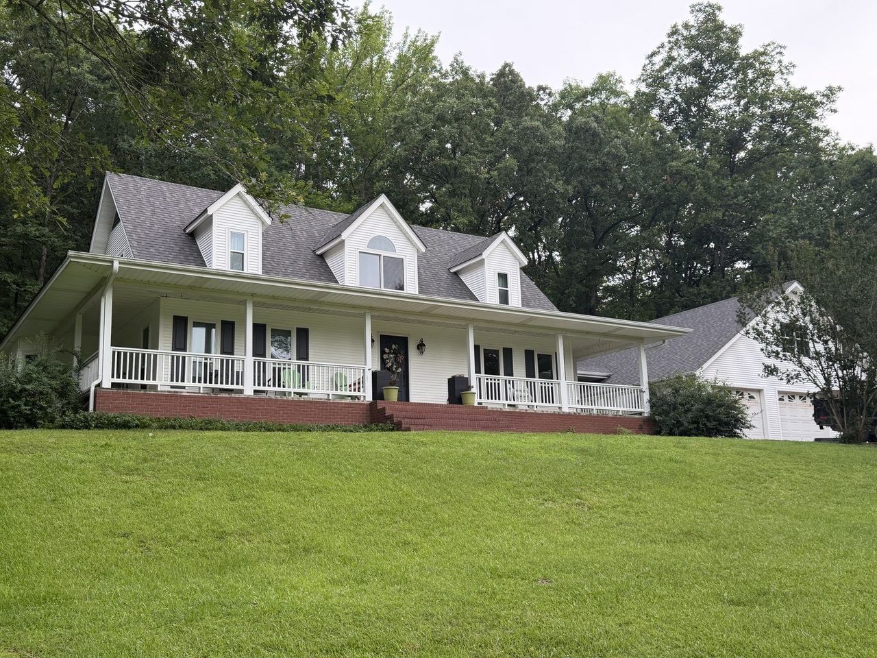 New CertainTeed Landmark shingle roof installed by Rumble Roofing after a storm claim in Glenwood, Arkansas