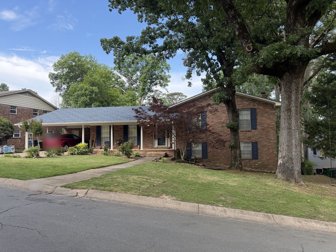 New IKO Dynasty shingle roof installed by Rumble Roofing after a storm claim in Little Rock, Arkansas