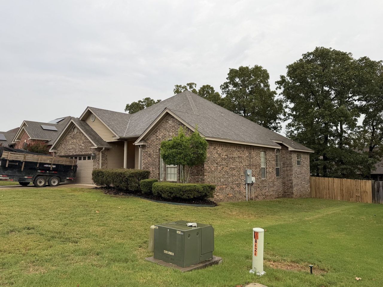 New Owens Corning Oakridge shingle roof installed by Rumble Roofing after a storm claim in Sherwood, Arkansas