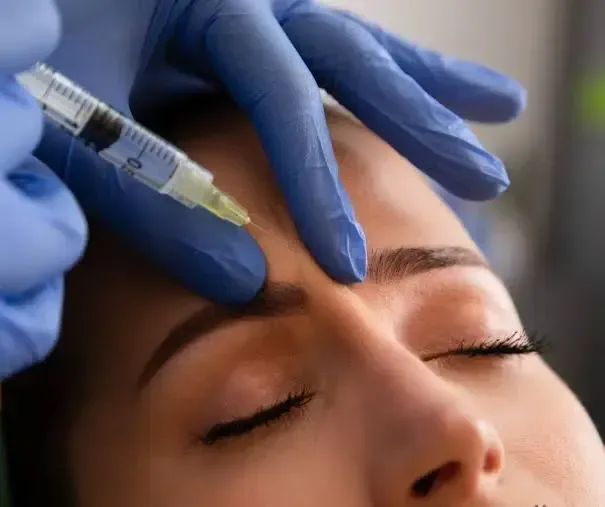 injecting xeomin to reduce frown lines